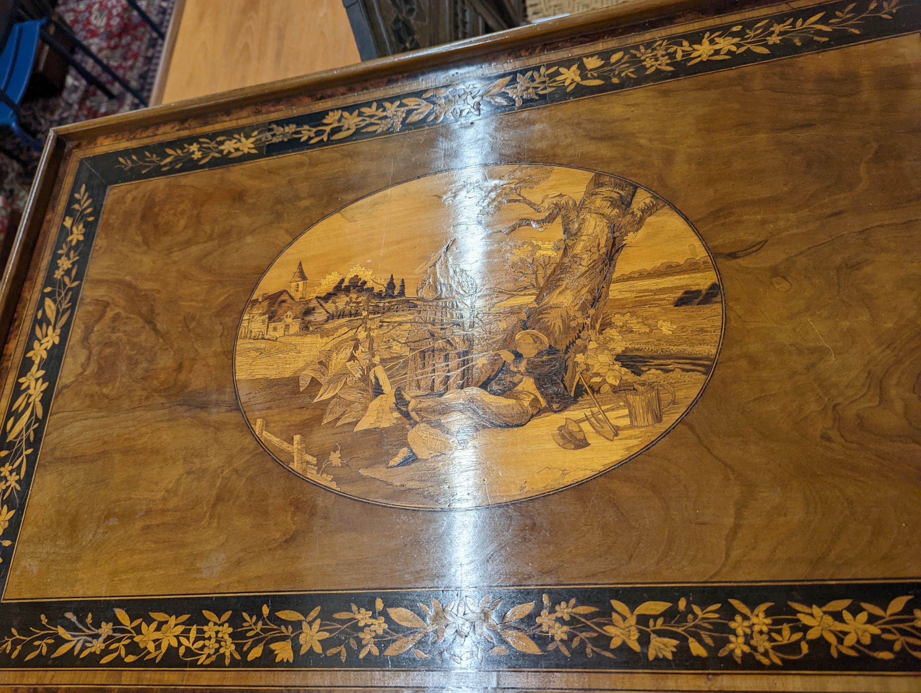 A 19th century Sorrento marquetry inlaid rectangular tray topped occasional table on folding bobbin stand, width 76cm, depth 48cm, height 72cm